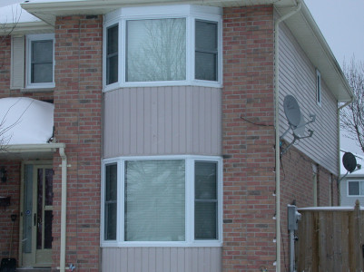 Bay Windows with Double Hung Side Flankers